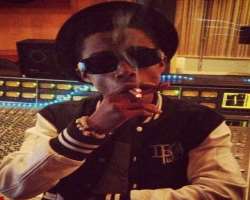 Lil Chuckee smoking
